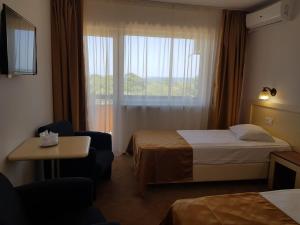 Cama o camas de una habitación en Hotel Petrolul