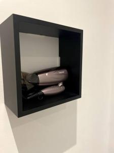 a black box with a blow dryer in it at StayQuality Apartments Vienna #1 in Vienna