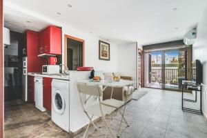 Kuchyň nebo kuchyňský kout v ubytování Home2Book Cozy Apartment Playa del Inglés, Pool