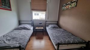 Ένα ή περισσότερα κρεβάτια σε δωμάτιο στο Ferienwohnung Friedenau +5 φωτογραφίες