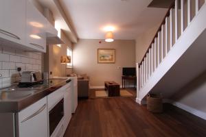 Dapur atau dapur kecil di Woodstock Suites