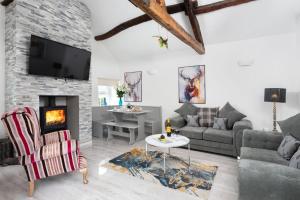 Μια τηλεόραση ή/και κέντρο ψυχαγωγίας στο Cottage - Sleeps 4 hot tub & pet friendly