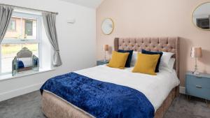 Ένα ή περισσότερα κρεβάτια σε δωμάτιο στο Cottage - Sleeps 4 hot tub & pet friendly