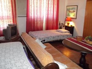 Postel nebo postele na pokoji v ubytování Karuc Apartments