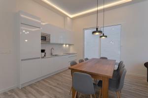 Kuchyň nebo kuchyňský kout v ubytování Fresh Velazquez Apartments