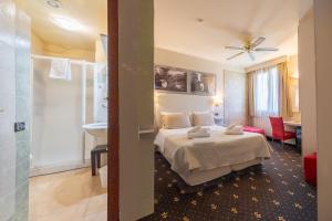 Postel nebo postele na pokoji v ubytování Holiday Rooms Antica Badia