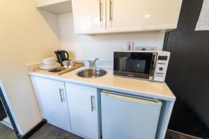 Dapur atau dapur kecil di Cosy Studio close to University of Birmingham