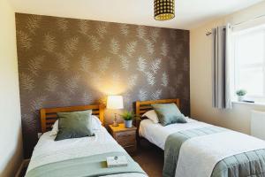 Φωτογραφία από το άλμπουμ του Luxury Trearddur Bay beach house with sea views σε Trearddur