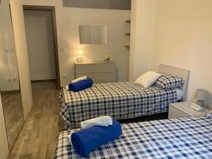 Postel nebo postele na pokoji v ubytování Casa de’ Sabini