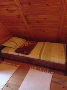 Llit o llits en una habitació de Vikendica Ana Tara