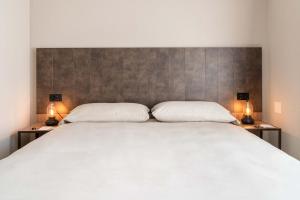 Ein Bett oder Betten in einem Zimmer der Unterkunft Relais Lucomagno