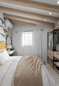 una camera con un grande letto e una finestra di Holiday Home Nico's a Cavtat