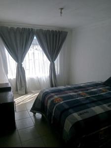 Легло или легла в стая в eManzini Guesthouse