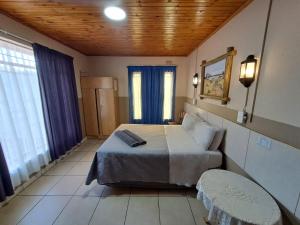 Sleep 'n Go Guesthouse的休息区