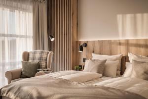 Postel nebo postele na pokoji v ubytování My Mayr MED Resort + 21 fotografií