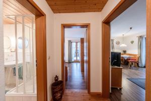 a hallway of a house with a living room at Landhaus Braun in Mittenwald