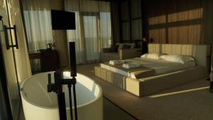 Postel nebo postele na pokoji v ubytování Hotel Nobilis Hall