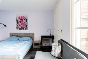 Postel nebo postele na pokoji v ubytování Sky Villa