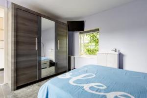 Postel nebo postele na pokoji v ubytování Sky Villa