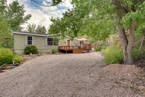 a home with a gravel driveway in front of a house at Modern Keystone Home 4 Mi to Mount Rushmore! in Keystone