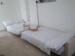 Posteľ alebo postele v izbe v ubytovaní Appartamento Centro Niscemi
