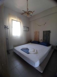 Ein Bett oder Betten in einem Zimmer der Unterkunft Seaside resort- kallithea