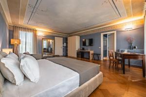 Postel nebo postele na pokoji v ubytování Monvì Wine Relais