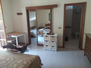 Letto o letti in una camera di Casa BnB Pappappero Monti della Laga