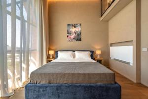 Postel nebo postele na pokoji v ubytování Monvì Wine Relais
