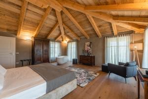 Postel nebo postele na pokoji v ubytování Monvì Wine Relais