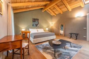 Postel nebo postele na pokoji v ubytování Monvì Wine Relais
