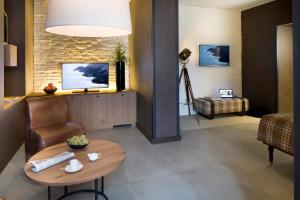 TV a/nebo společenská místnost v ubytování Starhotels Business Palace