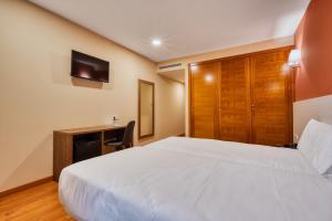 Cama o camas de una habitación en Checkin Madrid Móstoles
