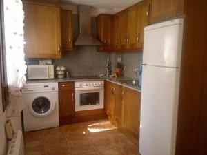 Η κουζίνα ή μικρή κουζίνα στο Acogedora Morada de Montaña