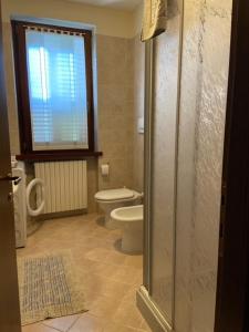 Koupelna v ubytování Casa Margherita + 13 fotografií