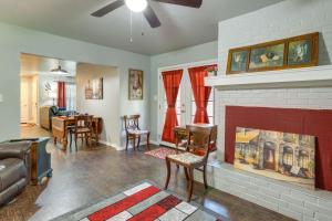 a living room with a fireplace and a couch at Cozy Norman Home 4 Mi to Oklahoma University! in Norman