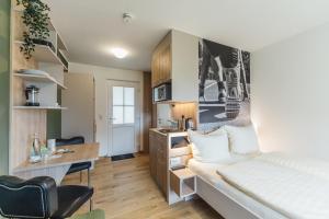 Postel nebo postele na pokoji v ubytování Hotel Bloemfontein