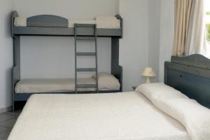 Postel nebo postele na pokoji v ubytování Hotel La Ninfea