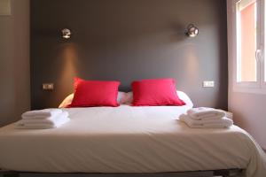Posteľ alebo postele v izbe v ubytovaní Hostal Totsompops