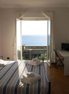 Кровать или кровати в номере La CONCHIGLIA Bed & Breakfast