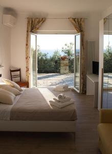 Кровать или кровати в номере La CONCHIGLIA Bed & Breakfast