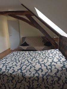 Llit o llits en una habitació de La Bruyère - B & B -