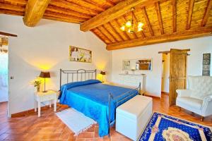 Ένα ή περισσότερα κρεβάτια σε δωμάτιο στο Casa Margherita 1 by PosarelliVillas