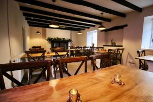 a dining room with a table and some chairs at The Wolfe Inn Wolfscastle in Haverfordwest