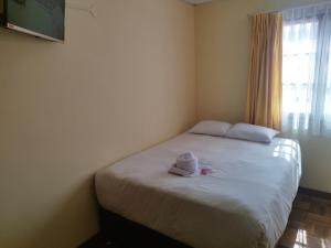 Postel nebo postele na pokoji v ubytování Hotel RustiCall