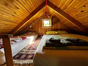 Een bed of bedden in een kamer bij Guest house Laguna