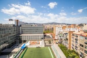 a tennis court on the roof of a building at S2SEP498 - Great apartment with private terrace in Barcelona
