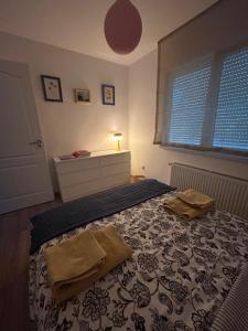 Posteľ alebo postele v izbe v ubytovaní Kisvirág Vendégház