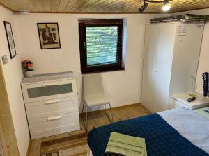 Postel nebo postele na pokoji v ubytování CSAOL Apartman ház