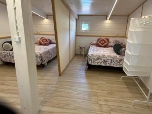 En eller flere senge i et værelse på La pinza azul + 5 billeder